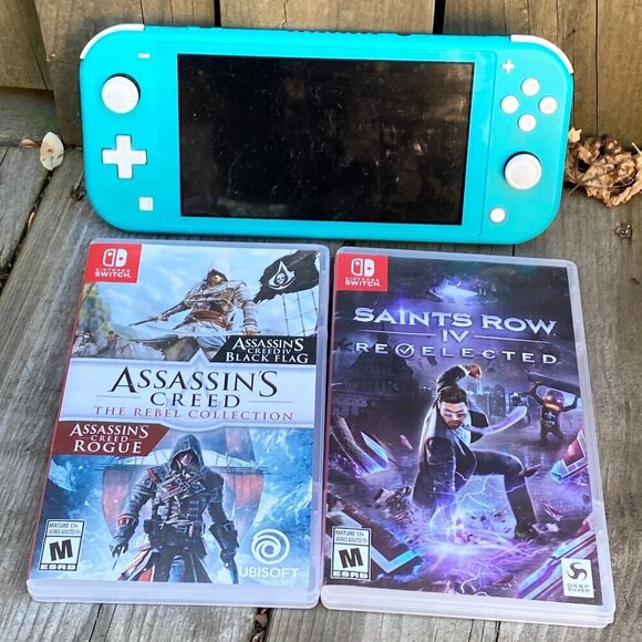 Nintendo Switch Lite Blue Bundle With 2 Games - Assassins Creed & Saints Row - Picture 2 of 7